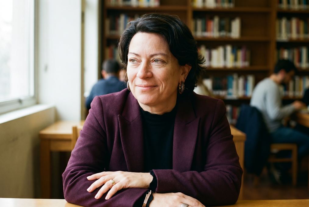 Subtle smile portrait in a bookshop